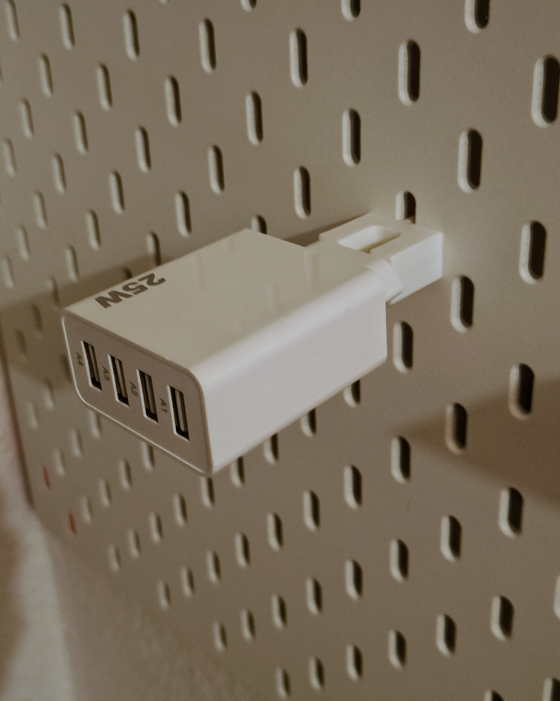IKEA Skadis pegboard: EU phone charger holders