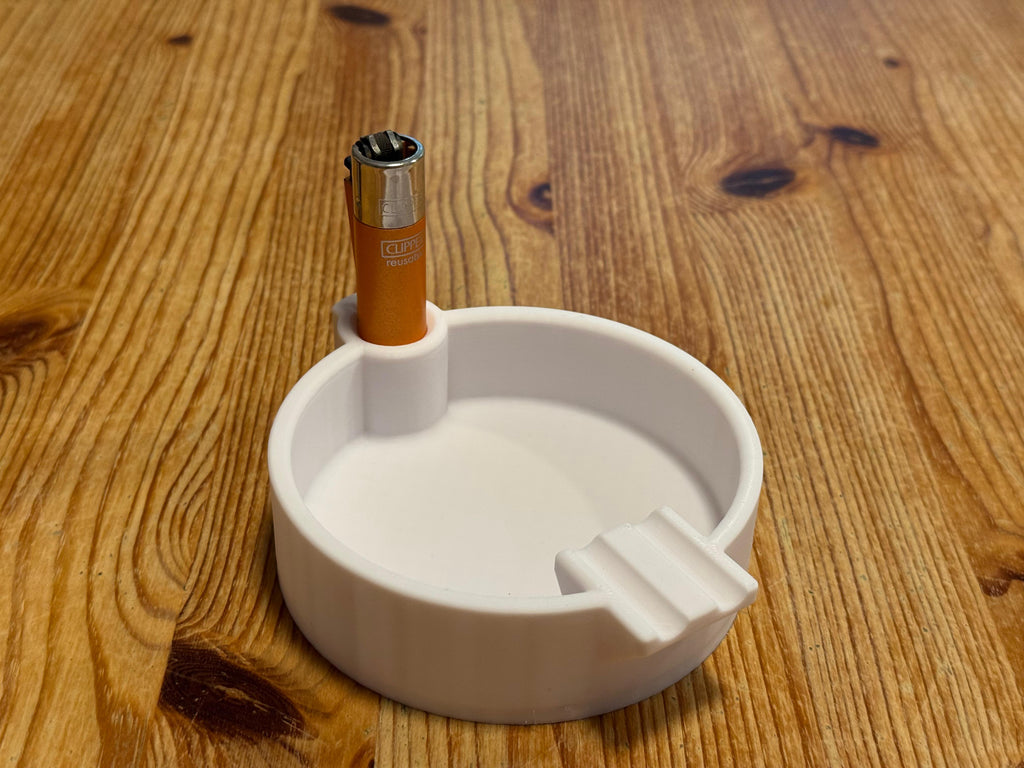 ASHTRAY with a clipper holder