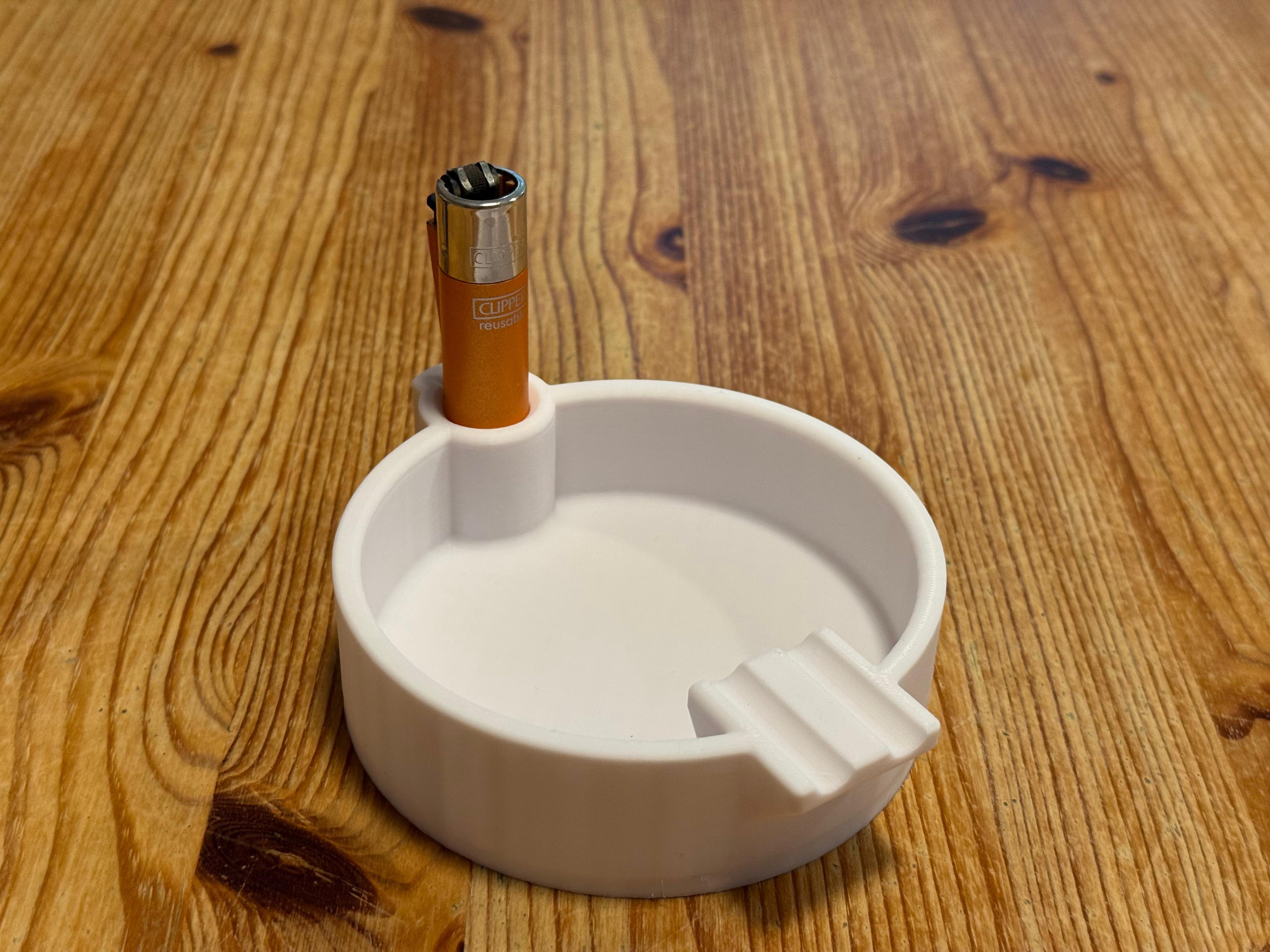 ASHTRAY with a clipper holder