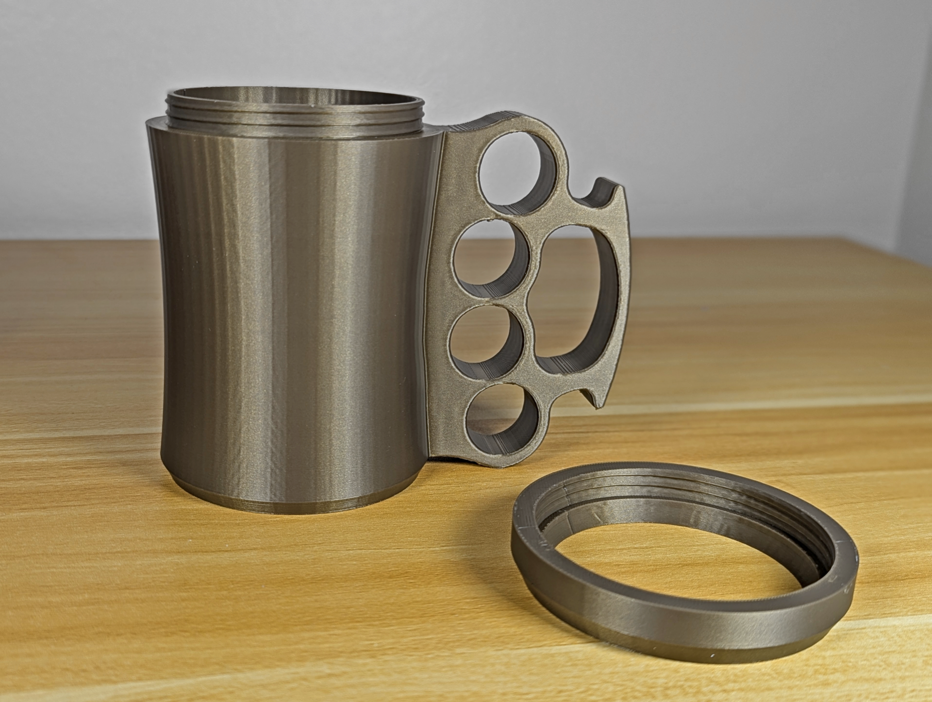 Brass Knuckle 12oz Can Koozie