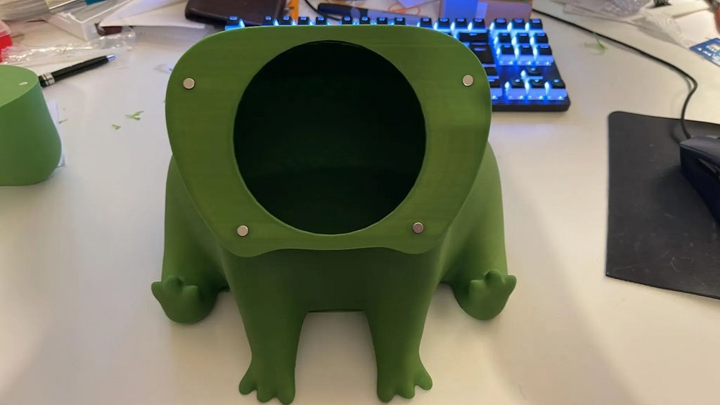 Fred The Frog, but a large magnetic container