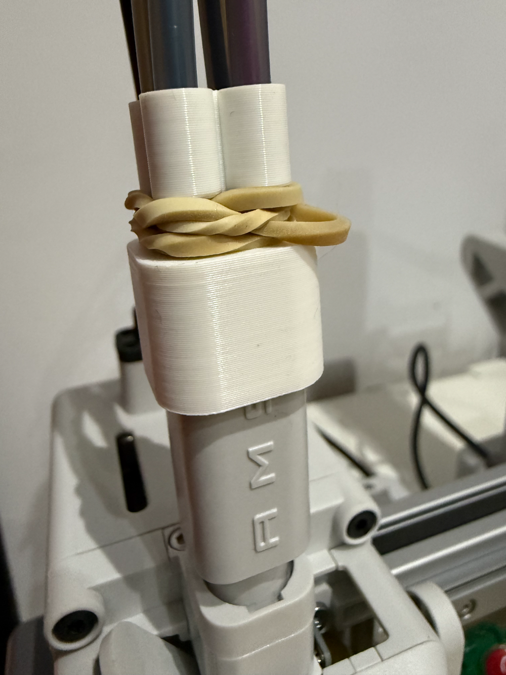 Sujetatubos ptfe al AMS LITE