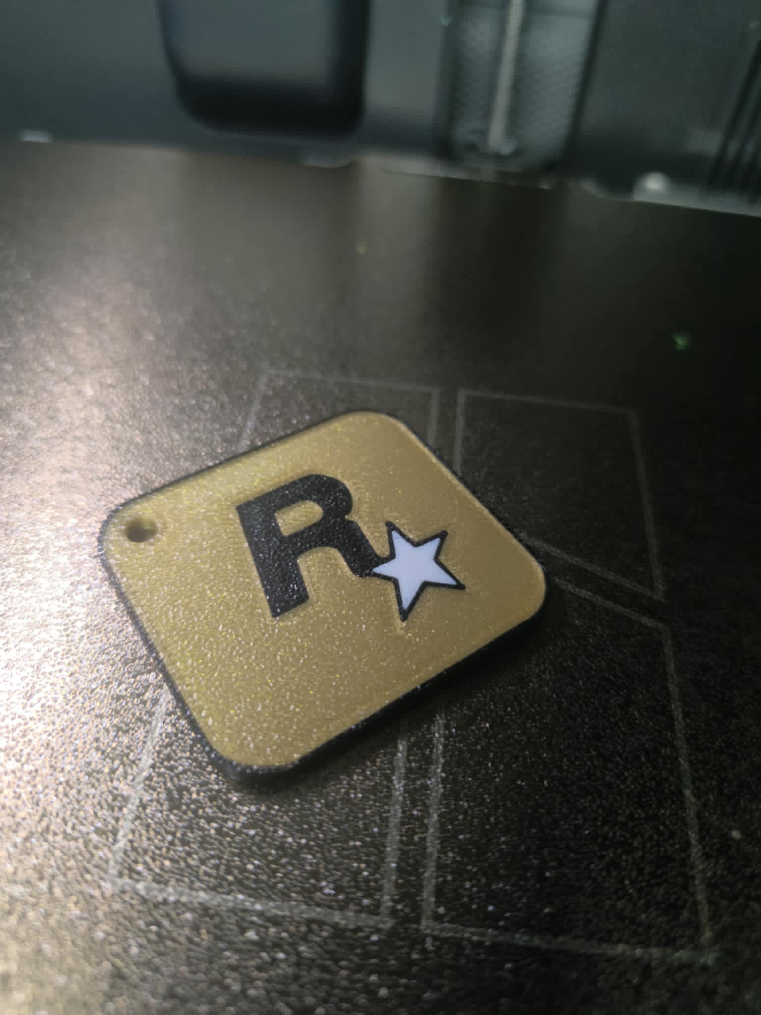 Rockstar logo keychain