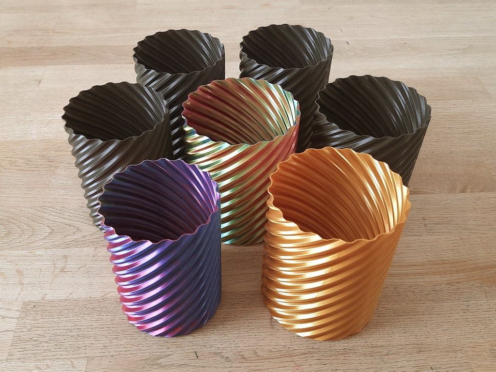 stackable pen holder cups, also nice to fidget with