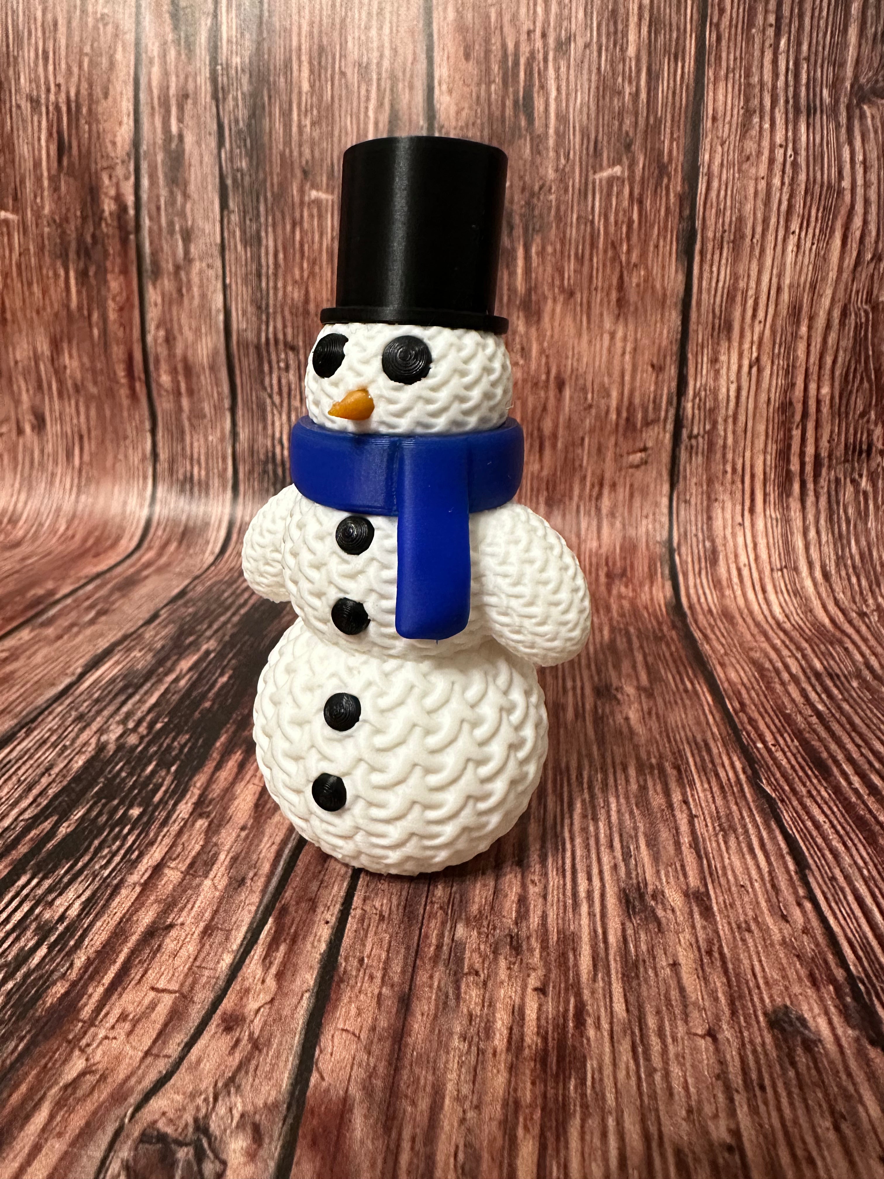 Cute Knitted Snowman with Hat and Scarf