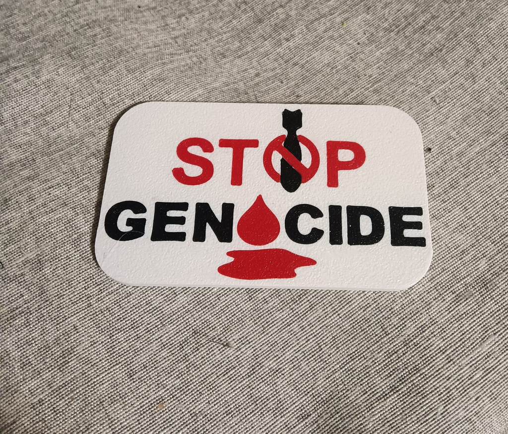 STOP GENOCIDE badge