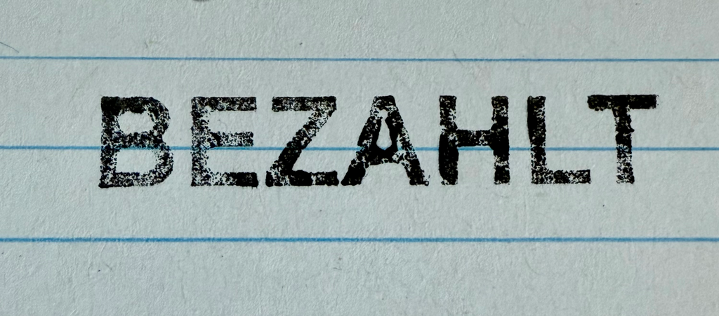 Stempel "BEZAHLT"