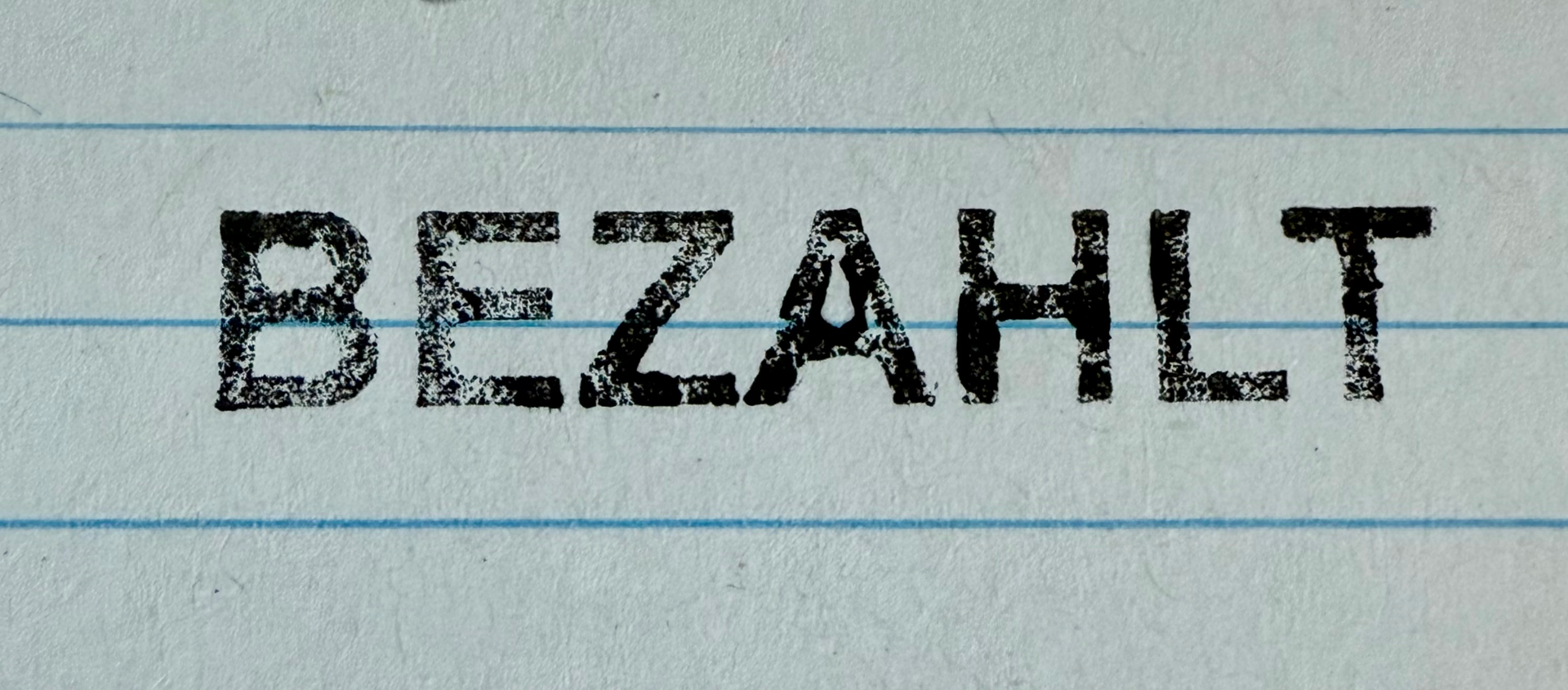 Stempel "BEZAHLT"