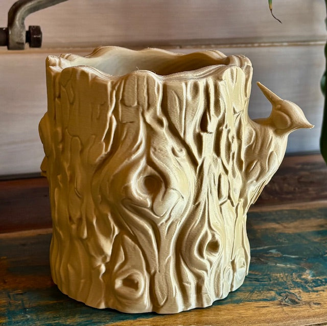 The Feathered Forest Log Planter