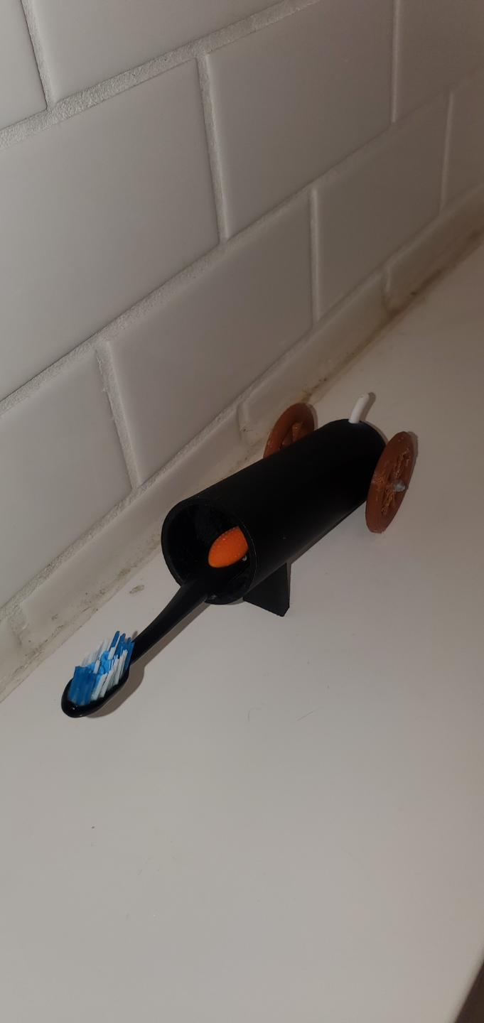 cannon toothbrush holder