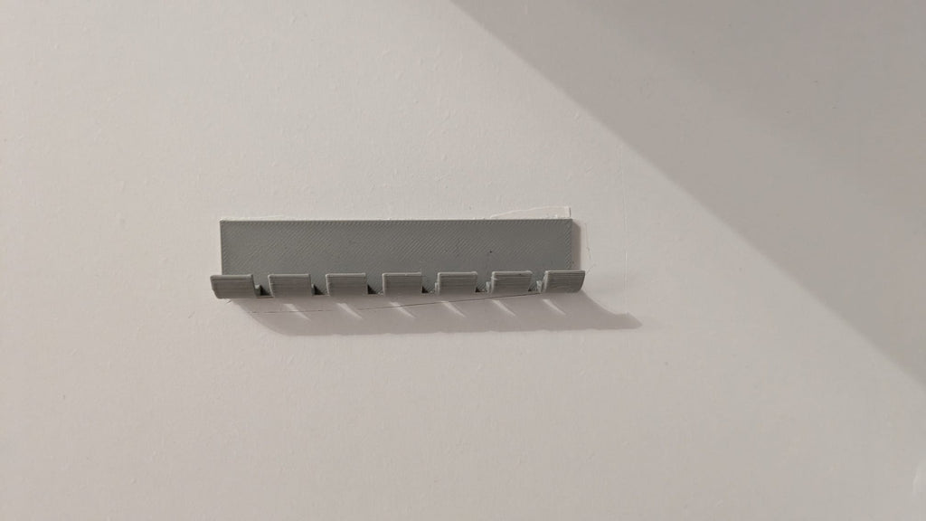 Wall-Mounted Cable Organizer & Management Rack