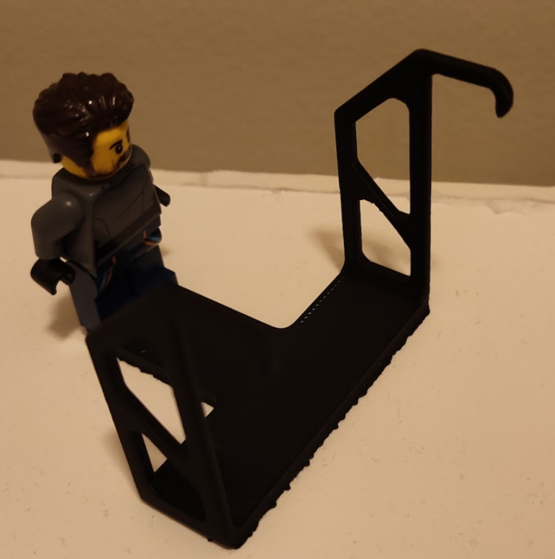 Brick person webcam hanger