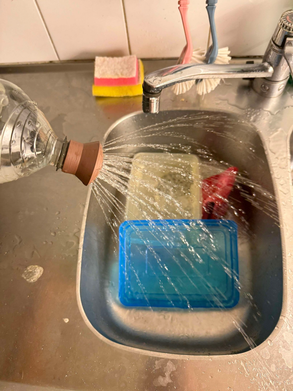 Soda bottle water nozzle