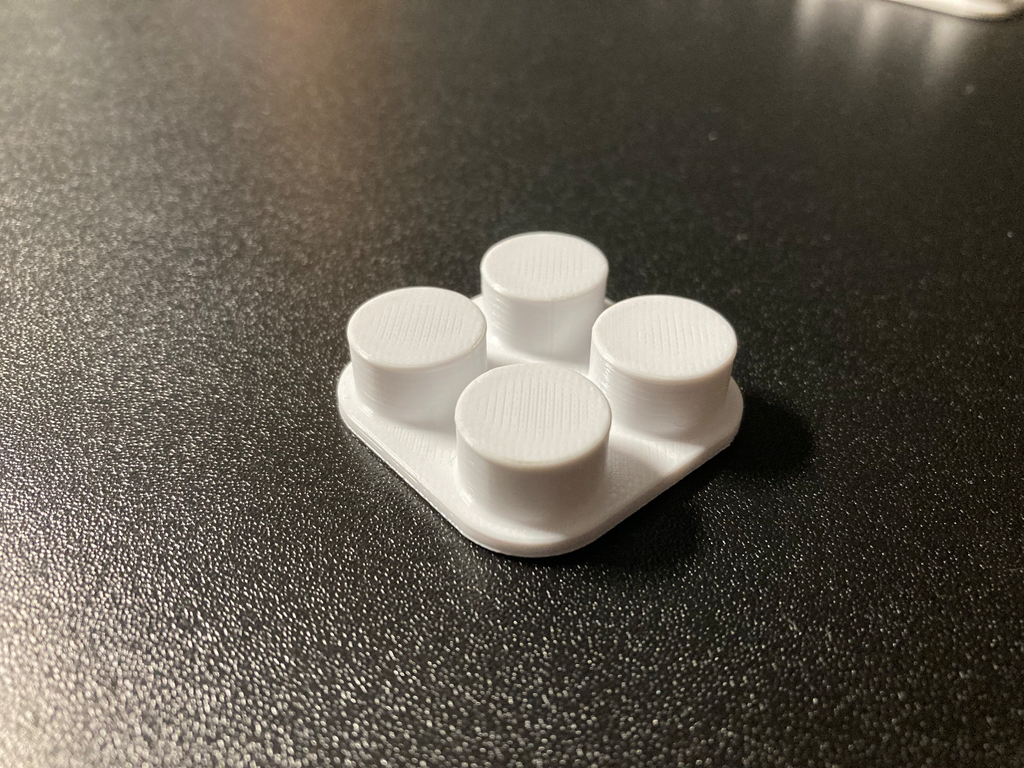 Brick like cable holder