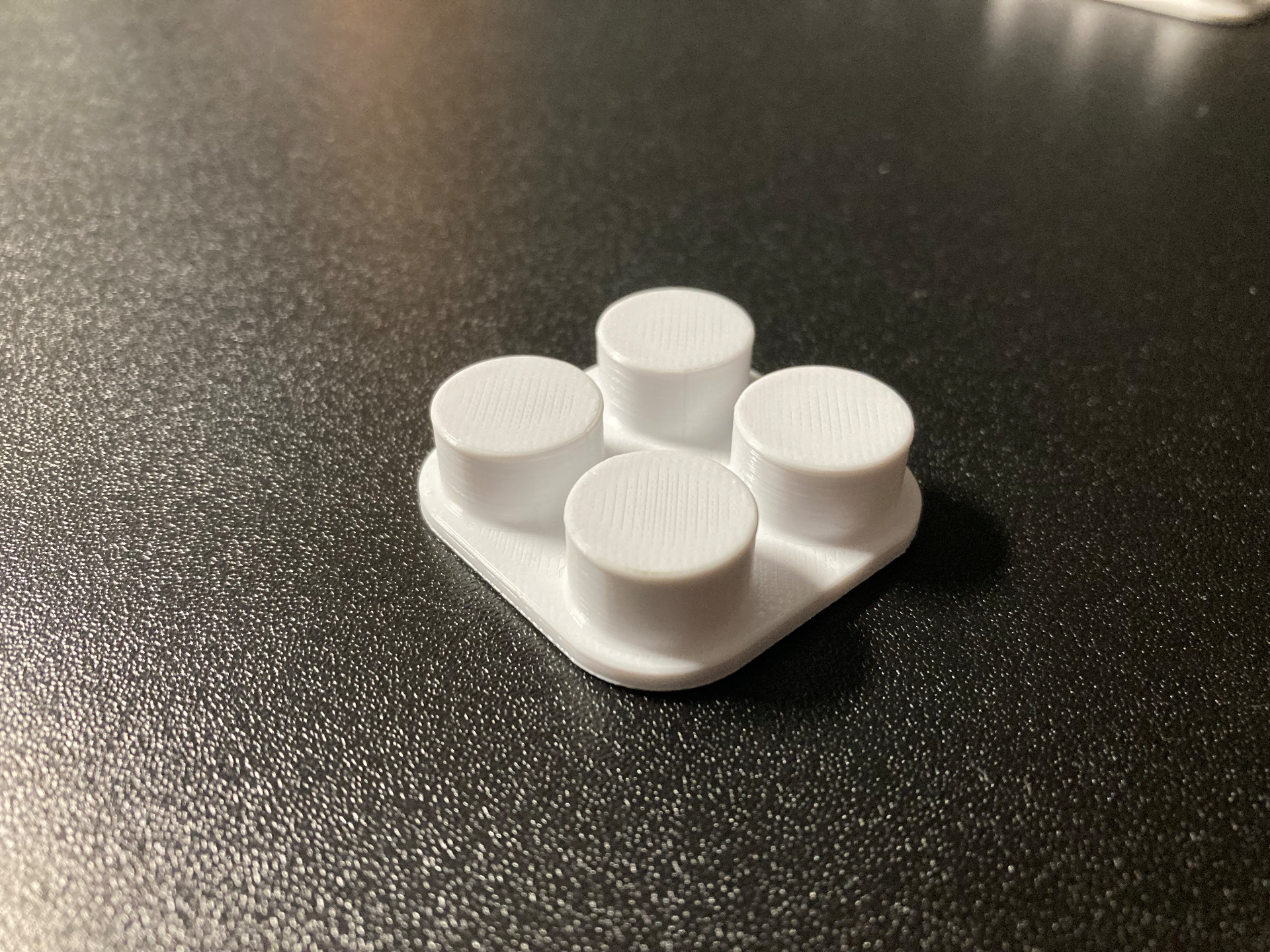 Brick like cable holder