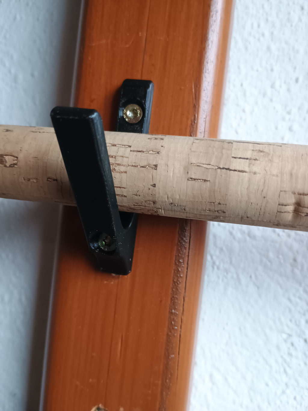 Universal fishing rod holder / hook