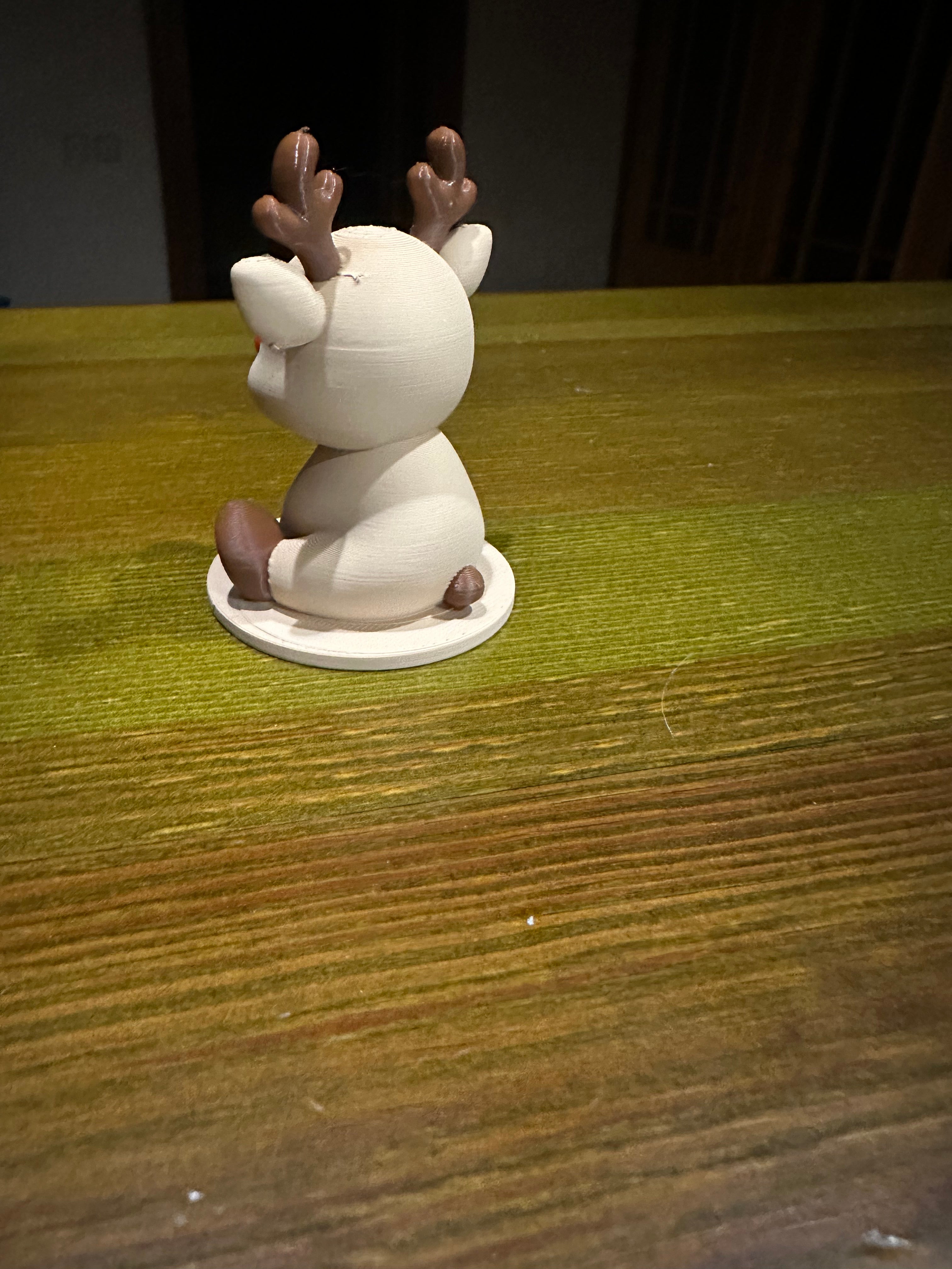 Cute Sitting Reindeer