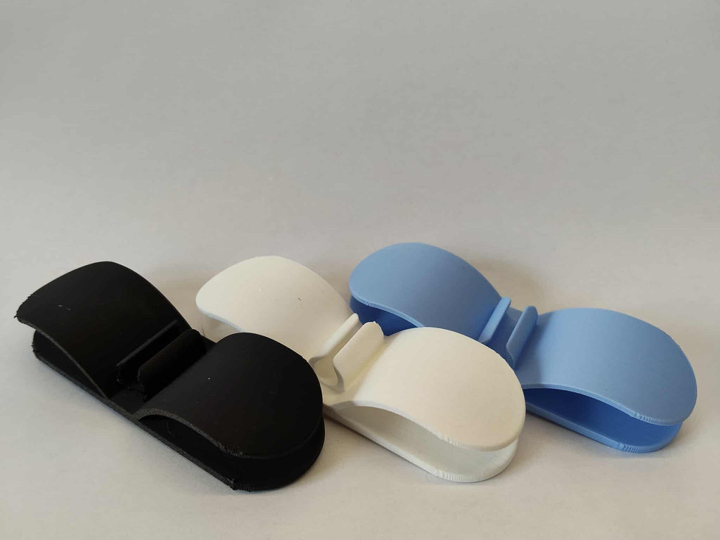 Stick-on cable organizer