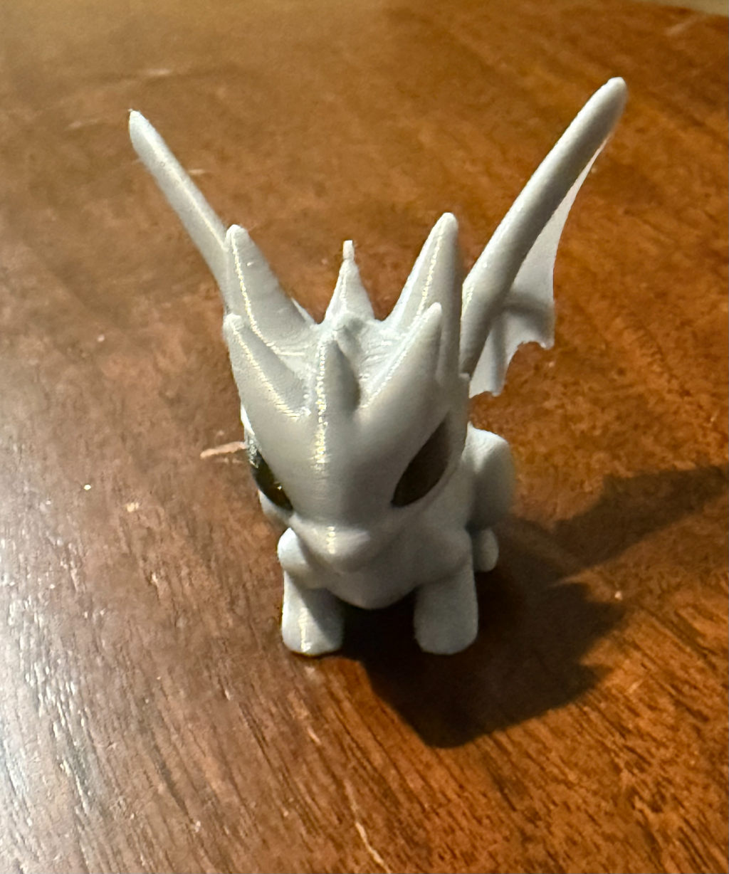 Cute squatting dragon