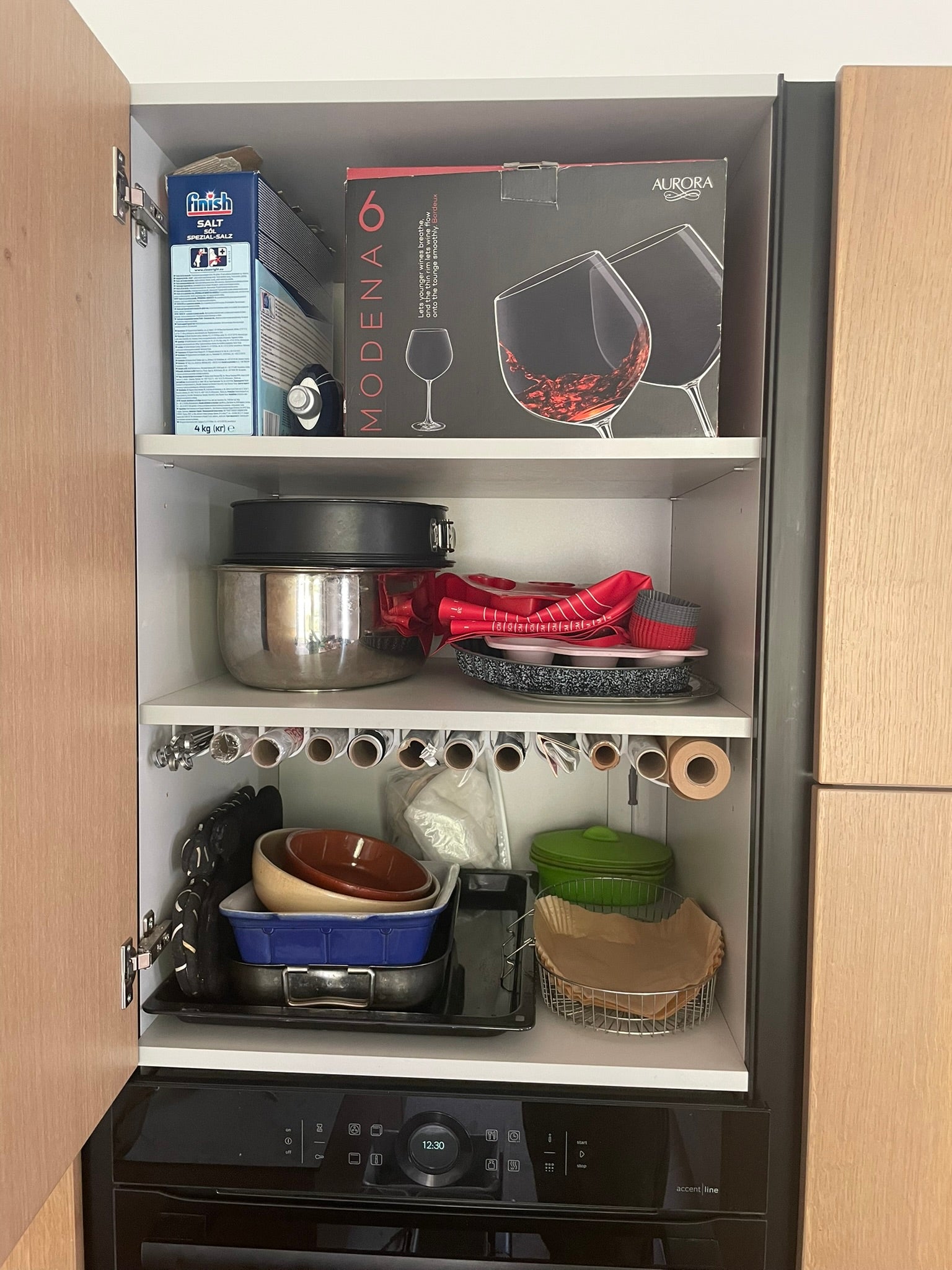 Rolls of kitchen foil and film organizer