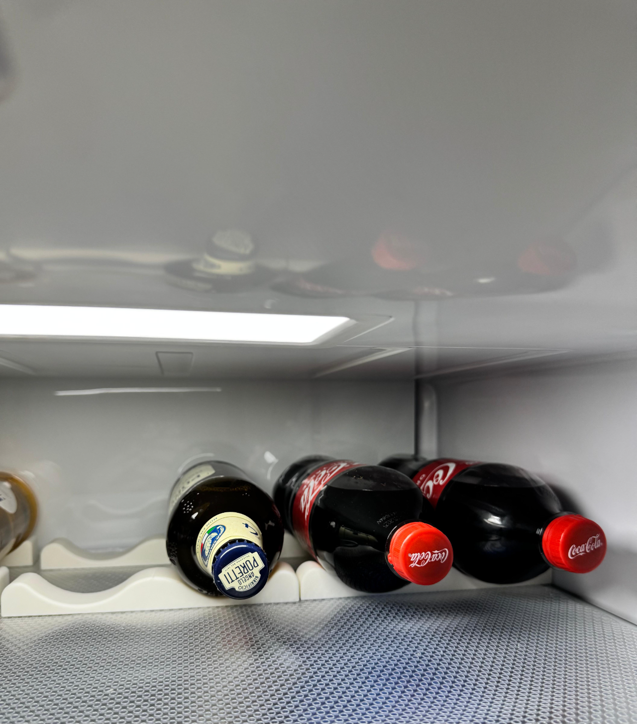 Ferma bottiglie per frigorifero