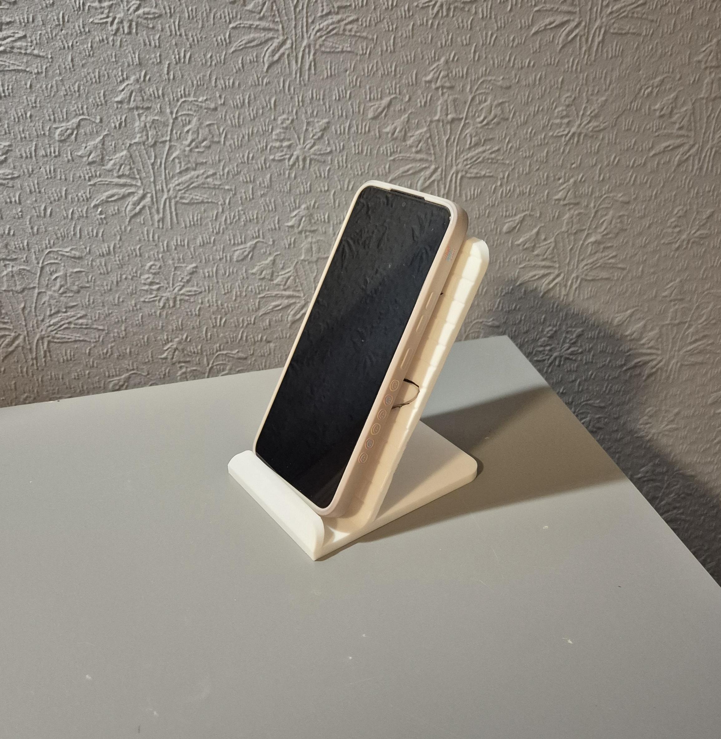Phone stand Pink Floyd The Wall. Free to sell.