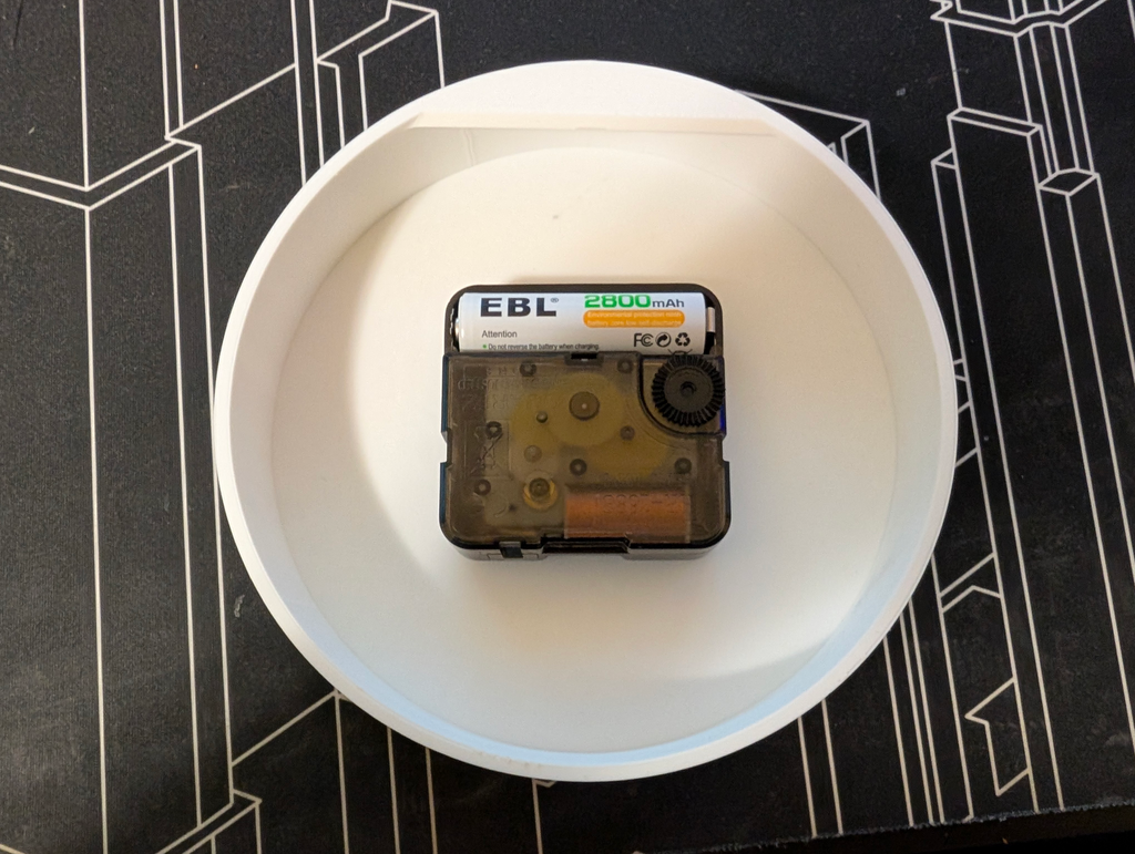 Clock with spinning clockface (AMS)