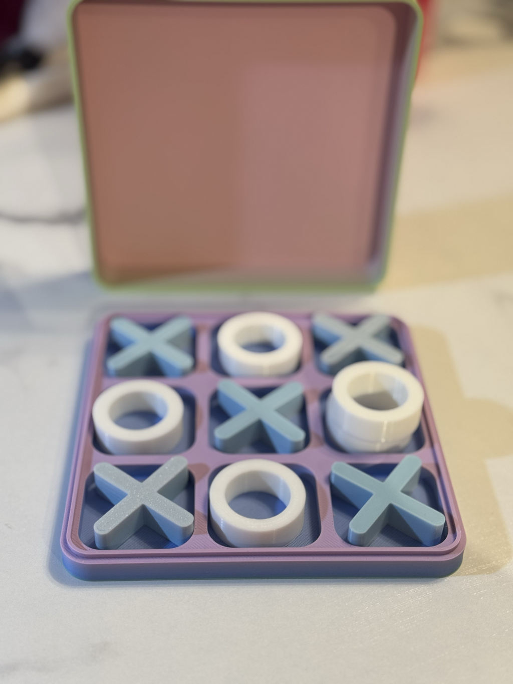 Tic-Tac-Toe game with storage container