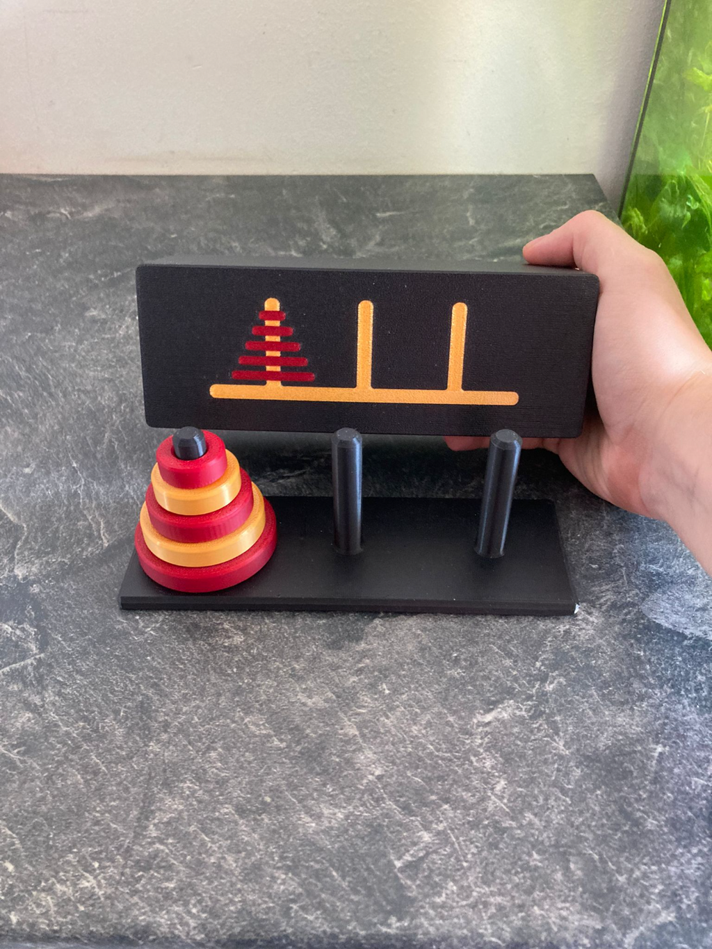 Tower of Hanoi with storage box