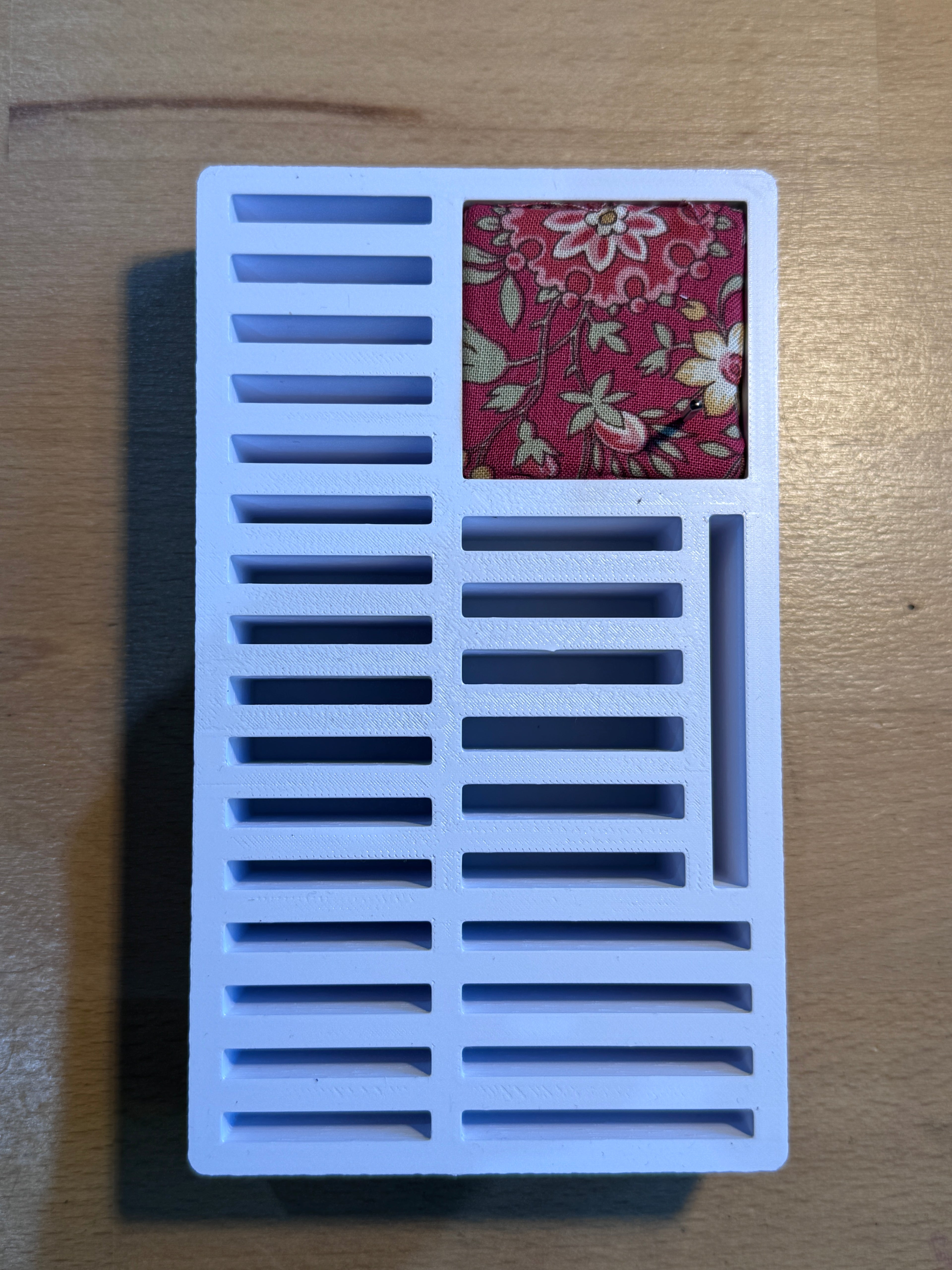 Sewing machine needle box