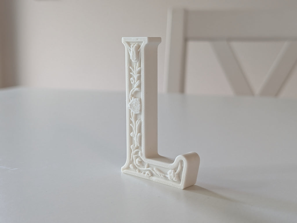 Standing Letter L in a Gypsum Floral Style