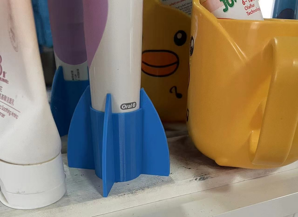 electric toothbrush holder rocket launcher