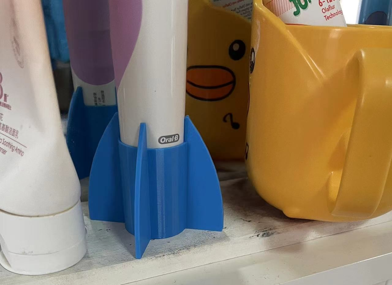 electric toothbrush holder rocket launcher