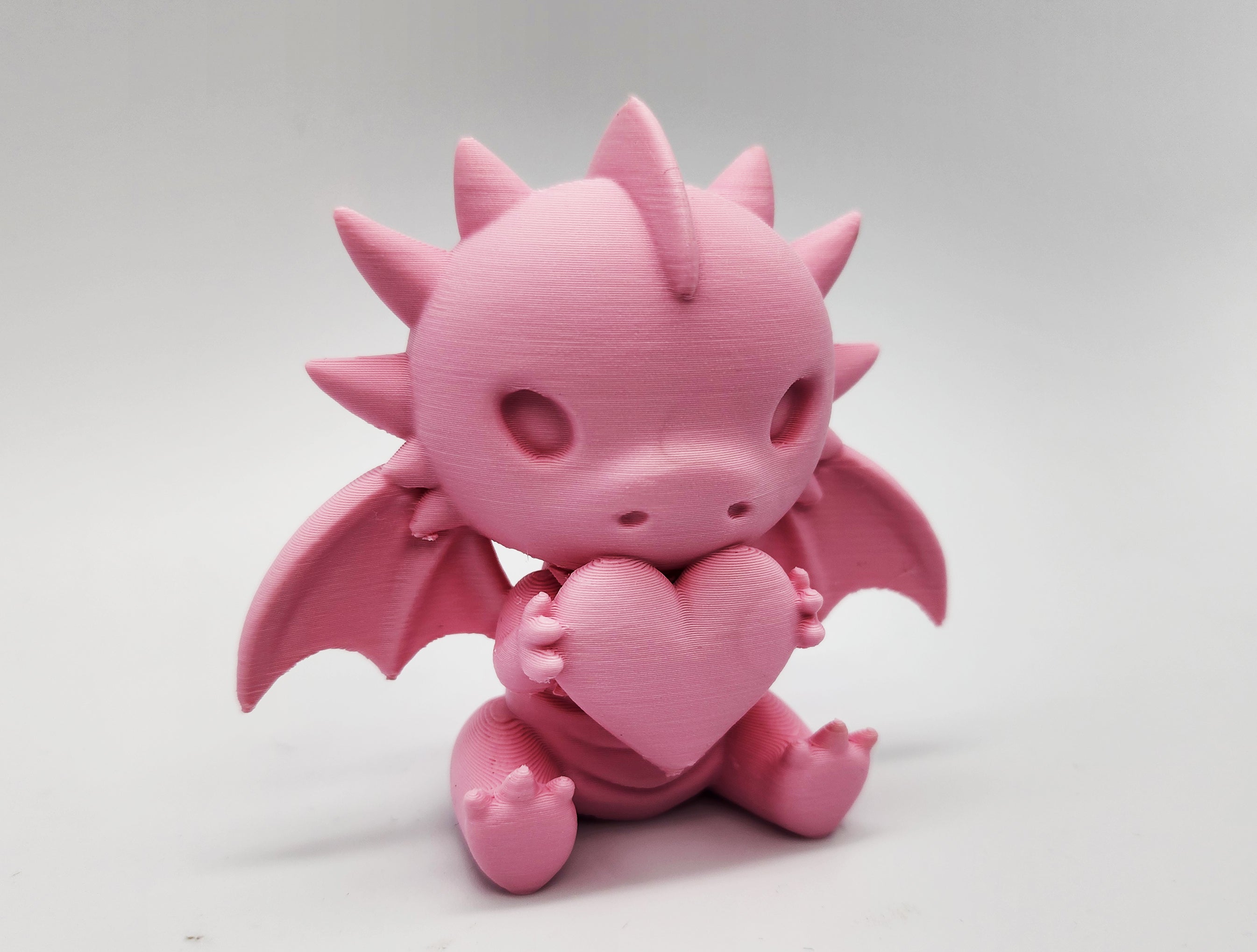 Cute Sitting Dragon with Heart Figure