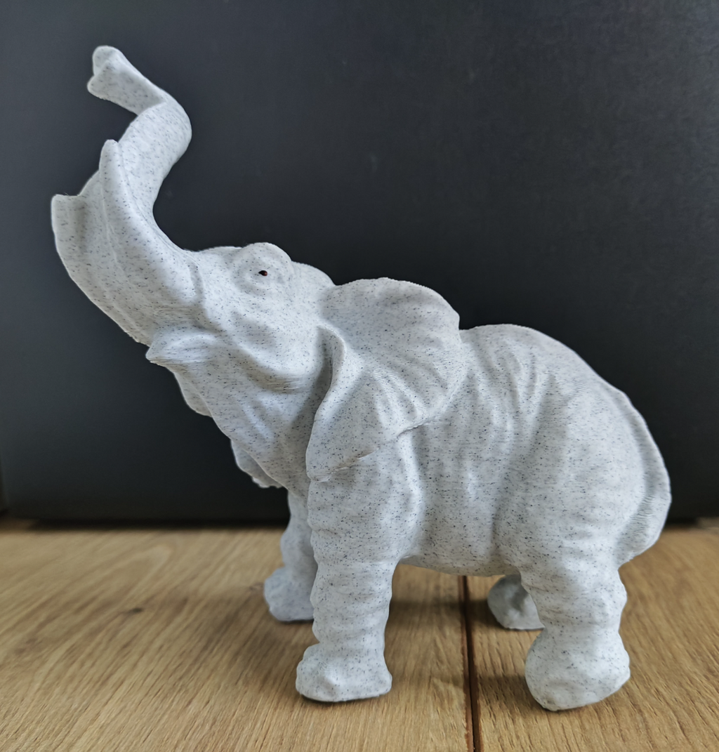 Standing elephant sculpture statue