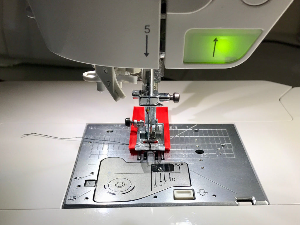 Sewing height compensation tool (Hebamme)
