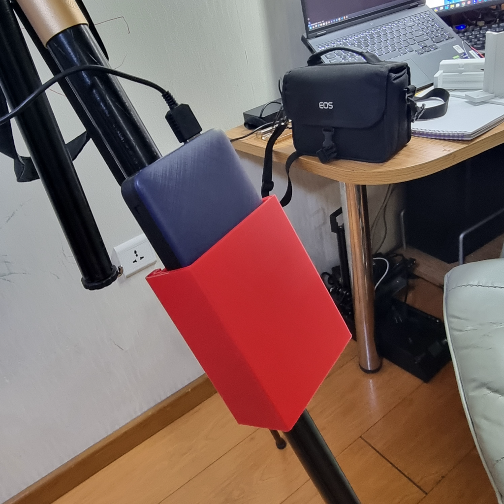 Power bank mount for tripod
