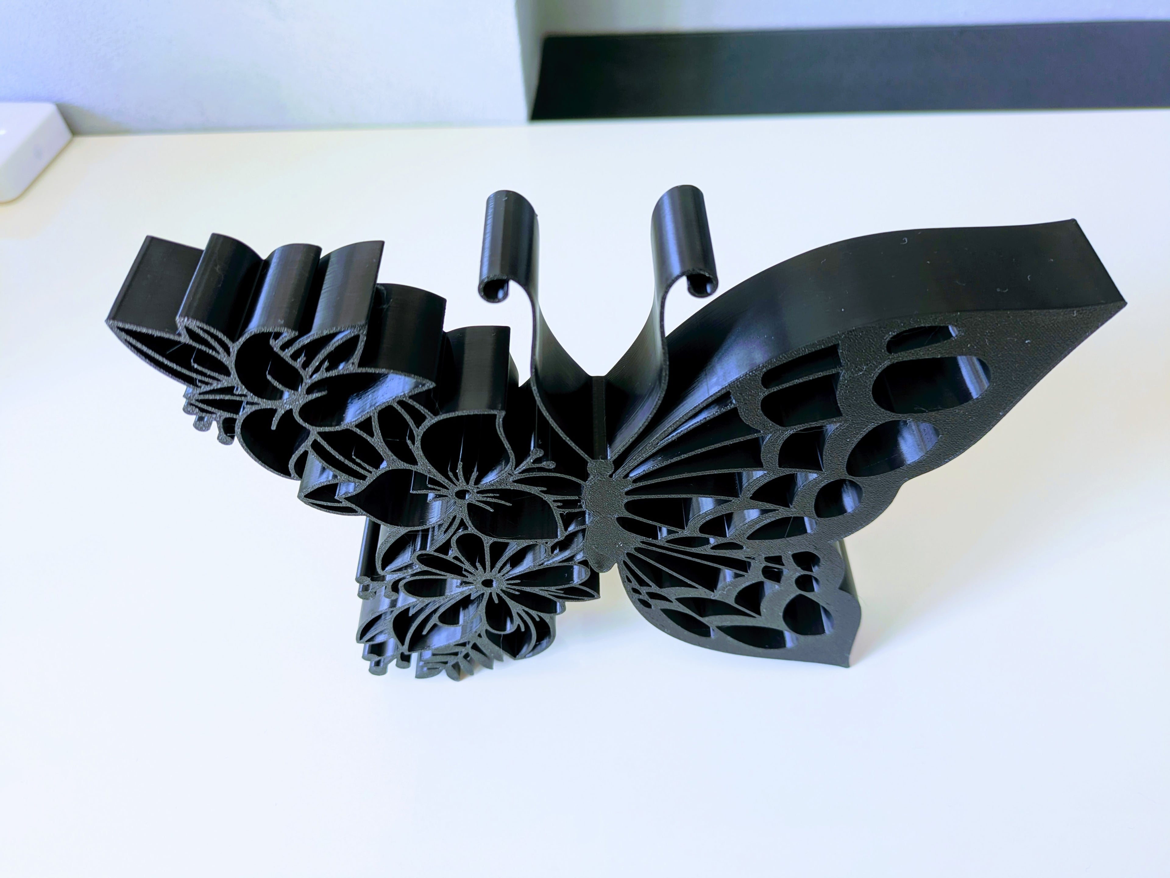 Floral butterfly ornament