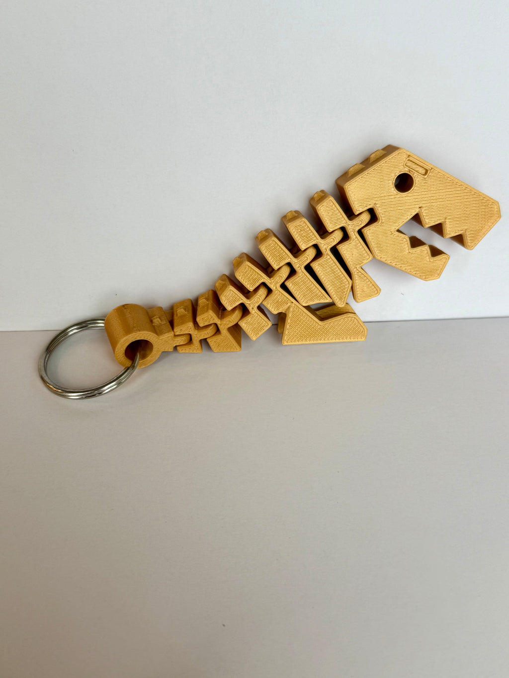 Flexi rex keychain