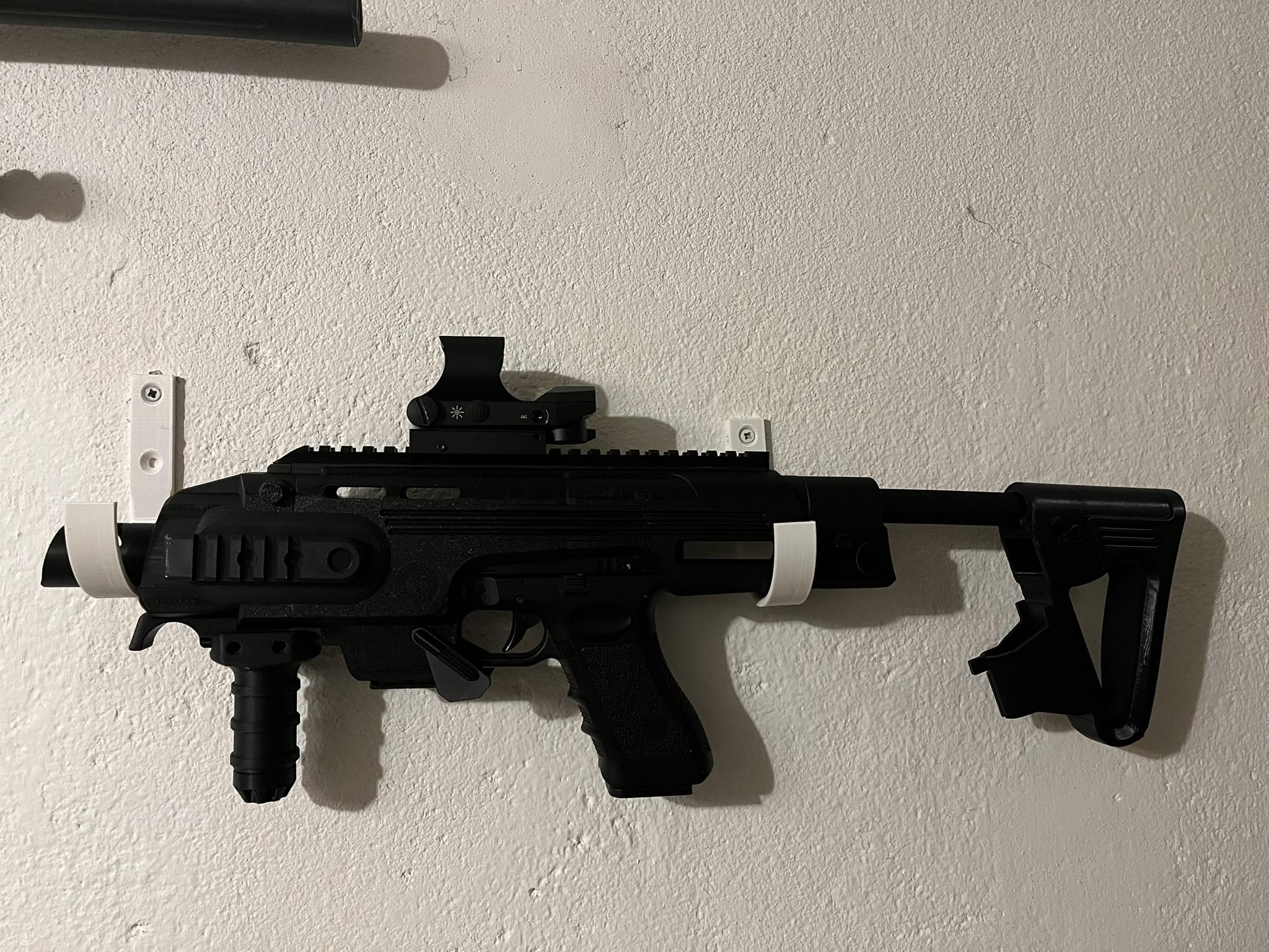 Holders, hangers for weapons and more