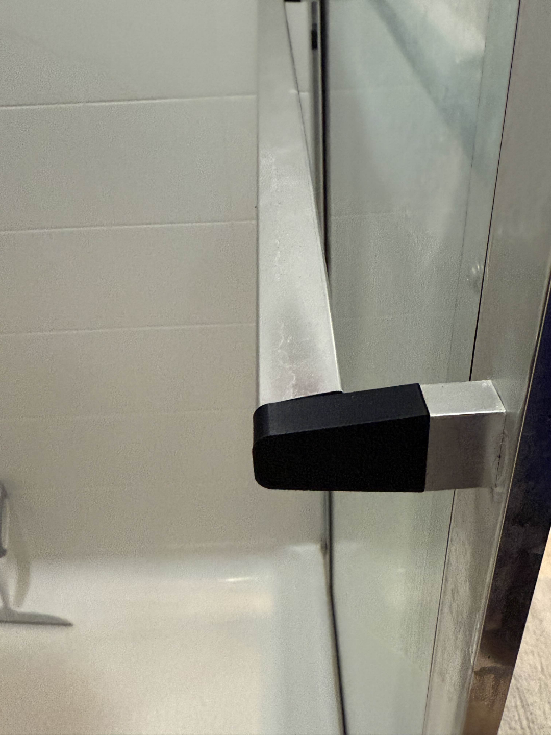 Shower door hardware