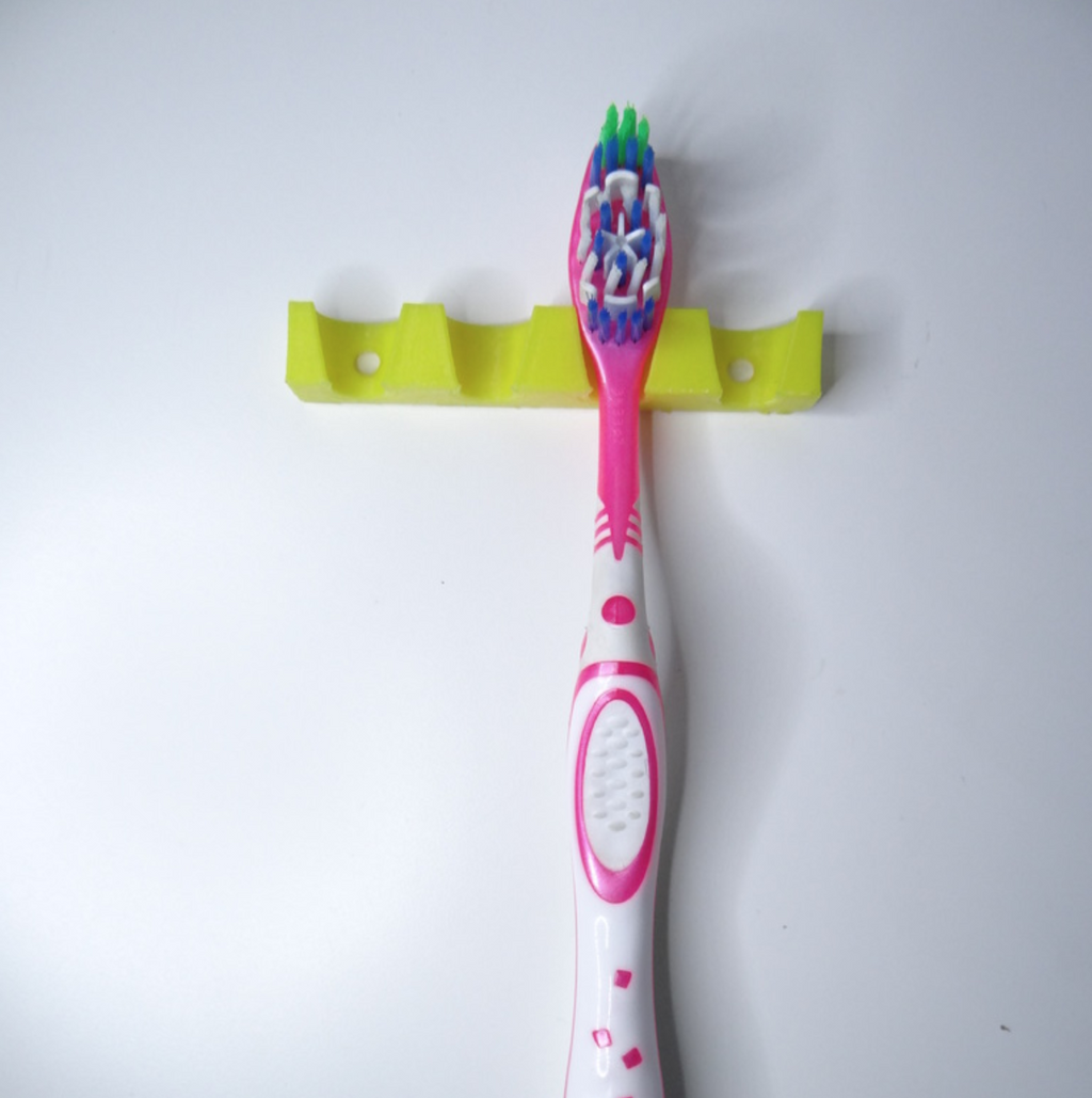 Simple wall tootbrush holder