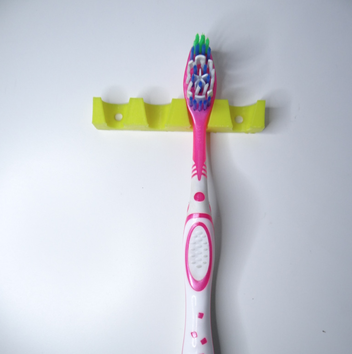 Simple wall tootbrush holder