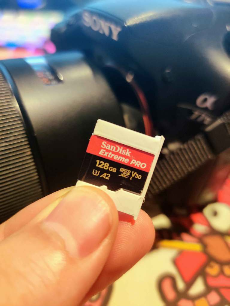 Camera hot shoe with SD card storage