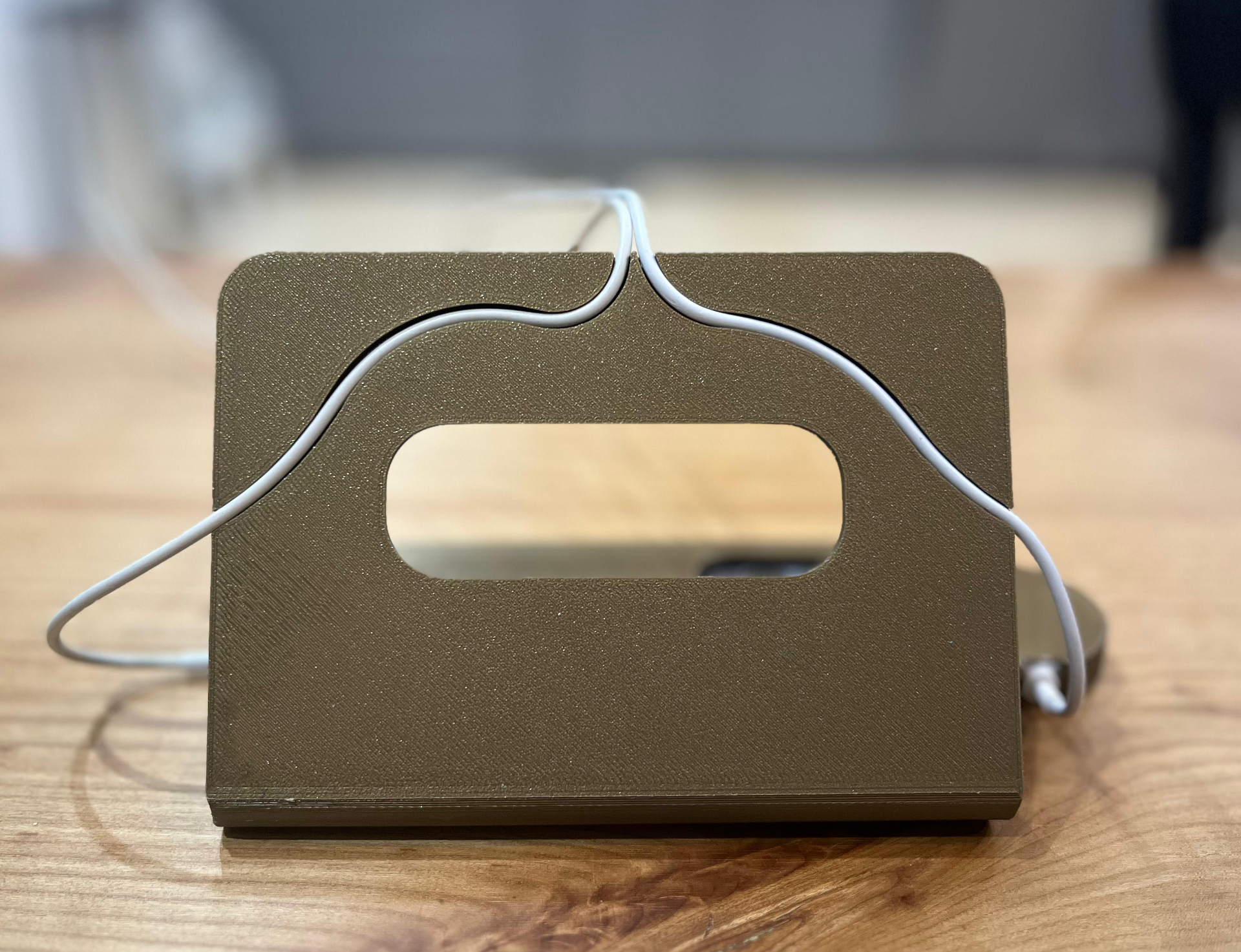 iPhone dock with Huawei GT 4 watch charger
