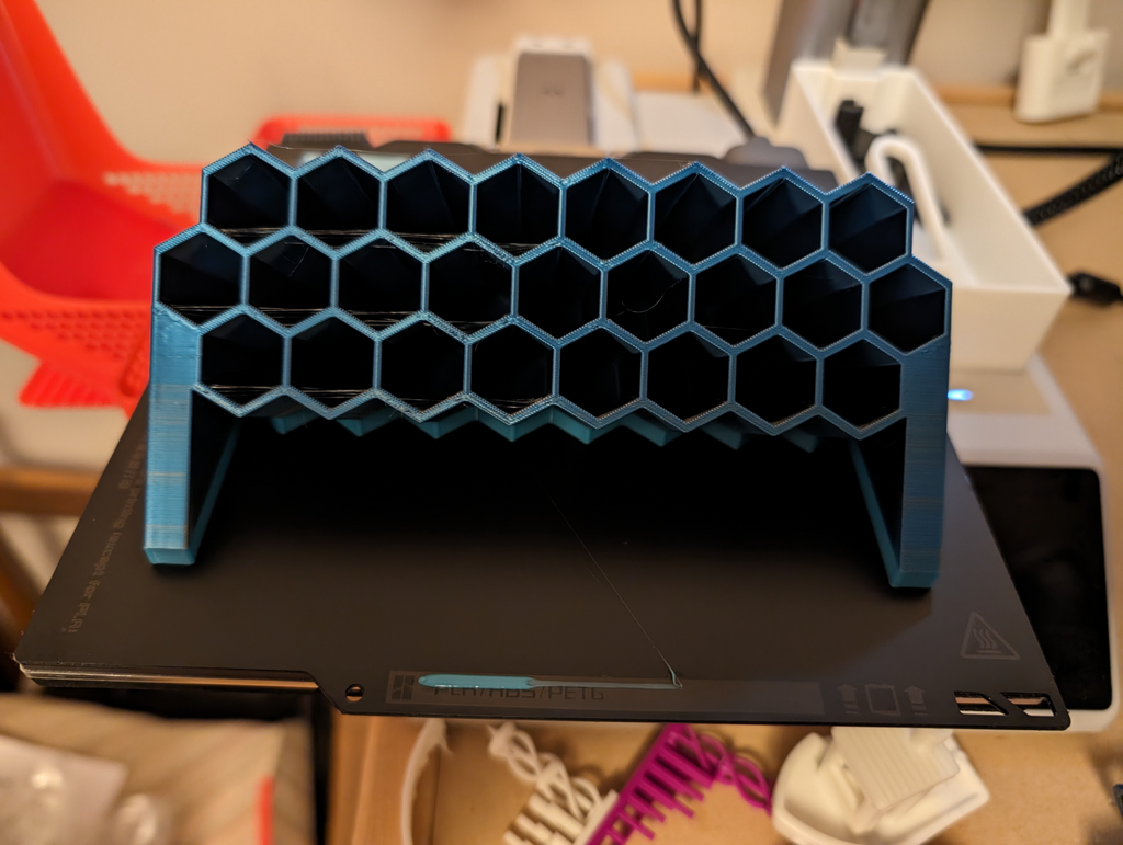 Angled hexagonal multicolor pen holder