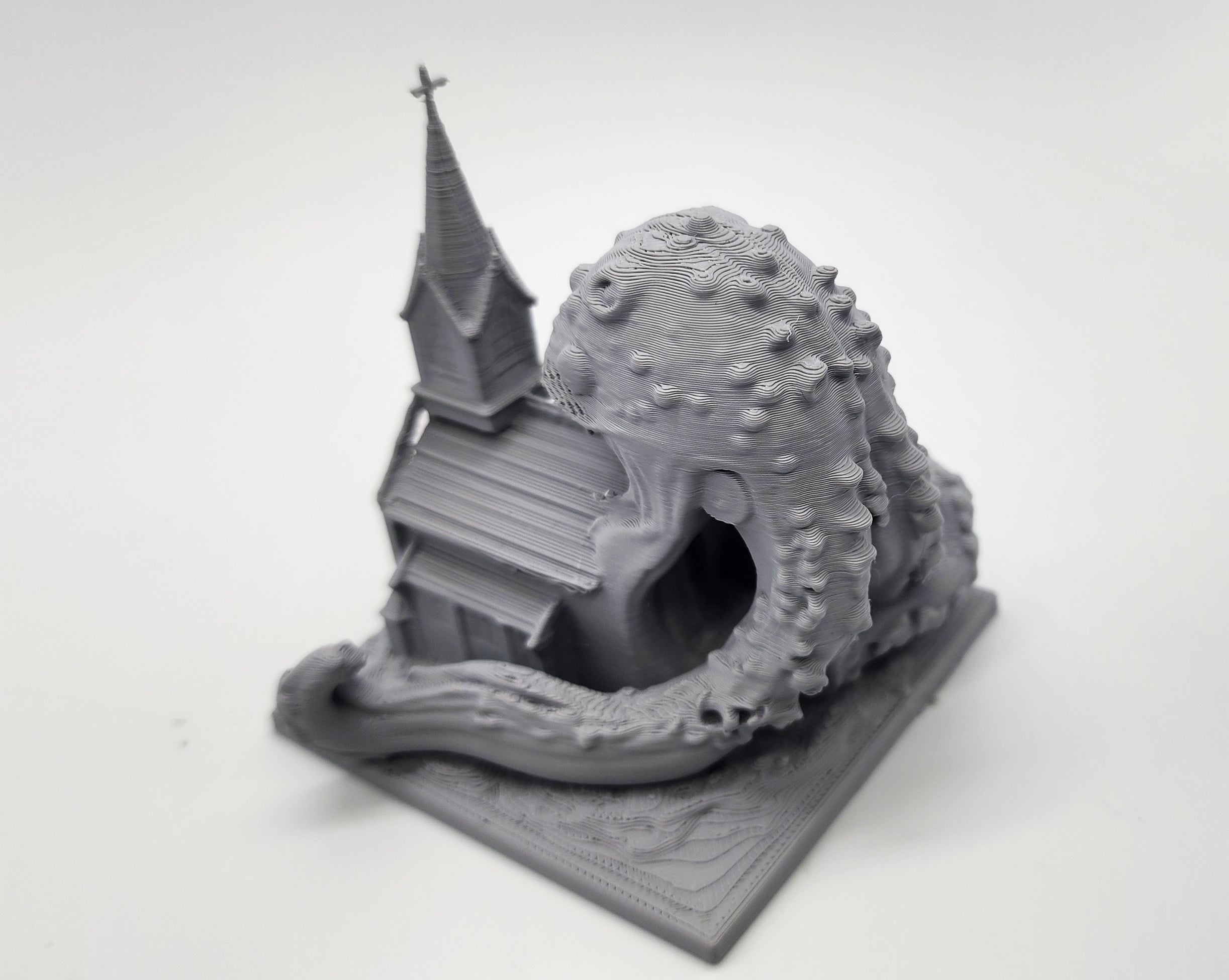 Cosmic Horror eating a Church Miniature