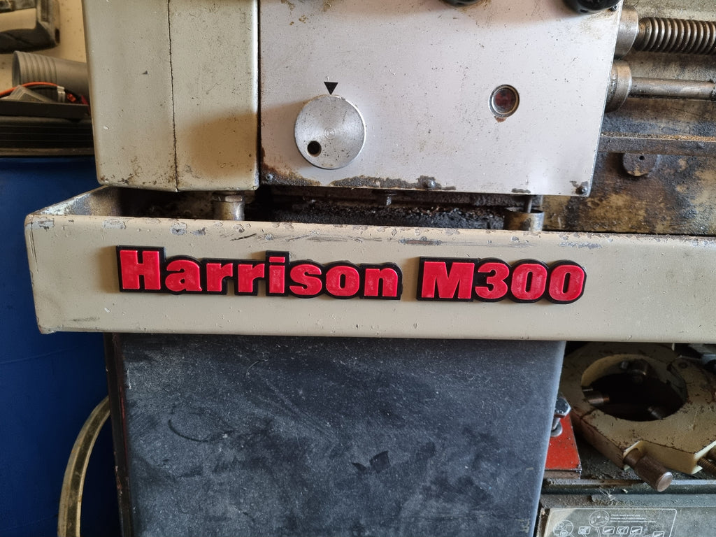 Harrison M300 badge
