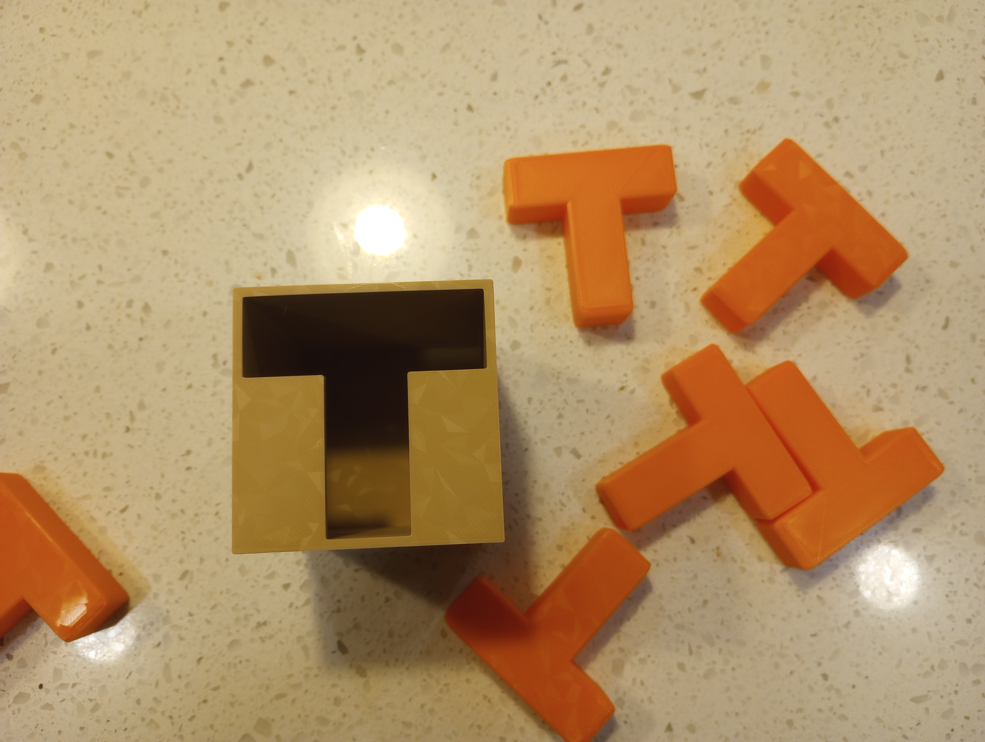 The 6 T Box Puzzle