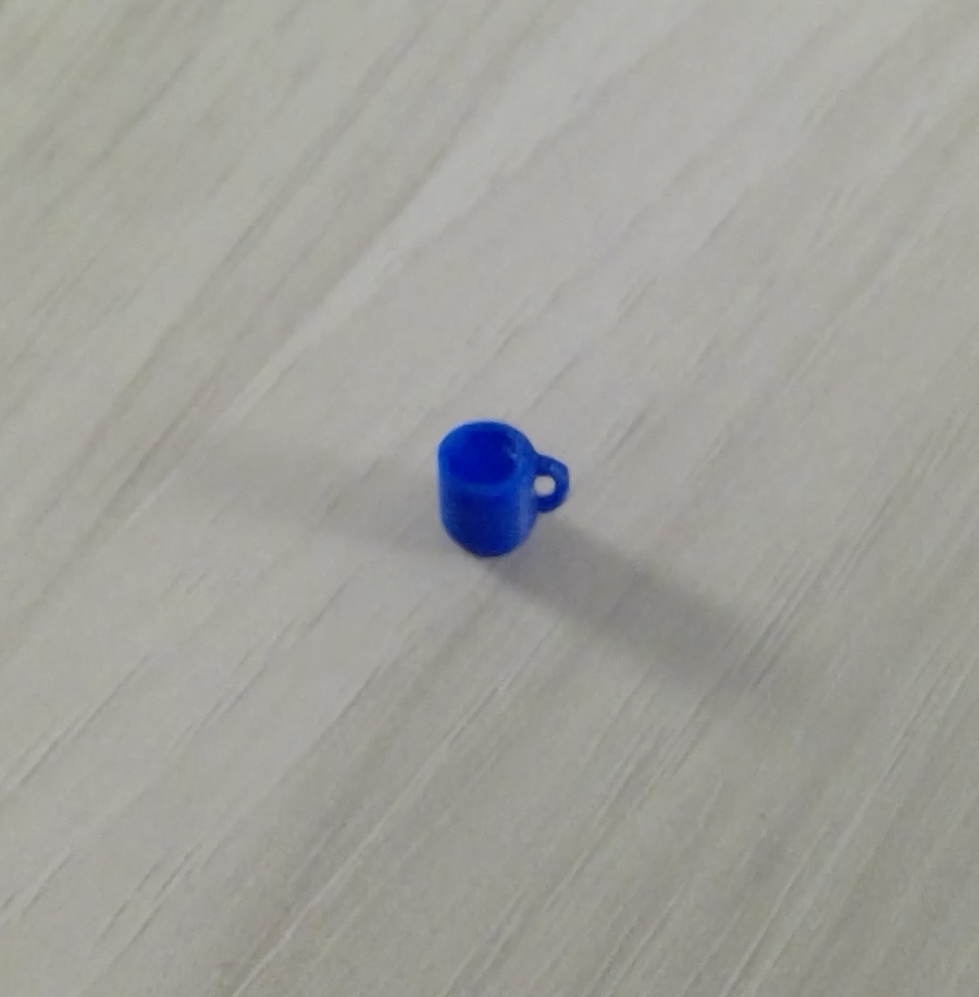 worlds smallest coffee cup (only .3 grams)